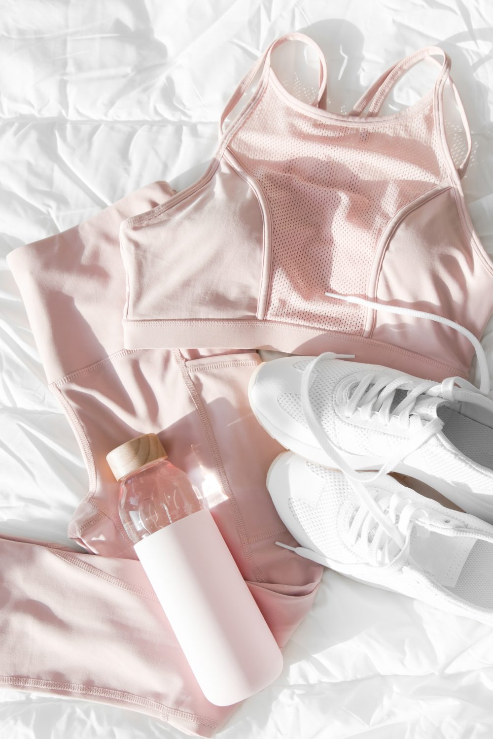 Blush pink activewear and drink bottle