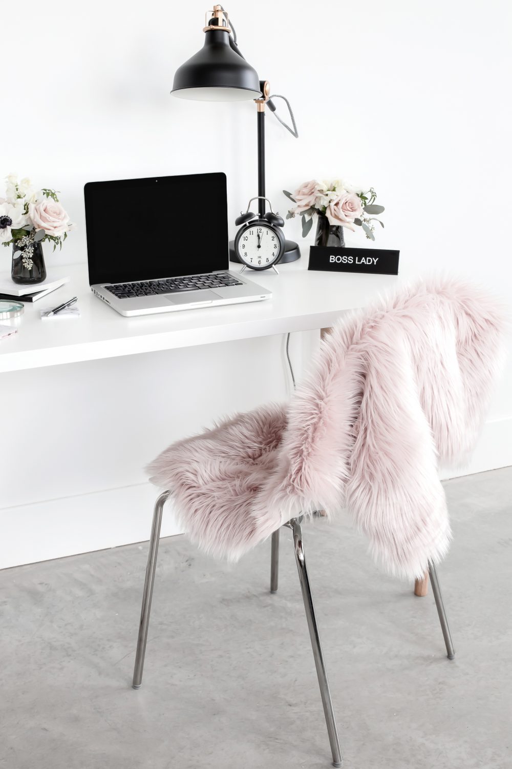 Workspace with blush blanket on chair