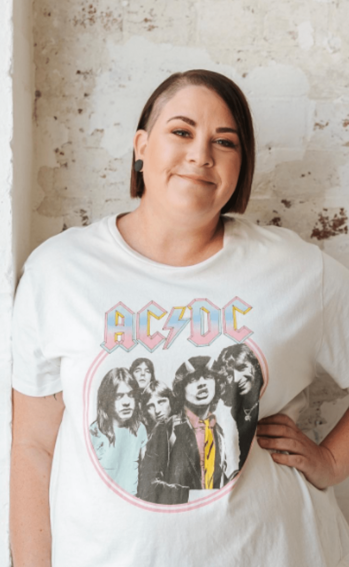 White woman in cool ACDC tshirt